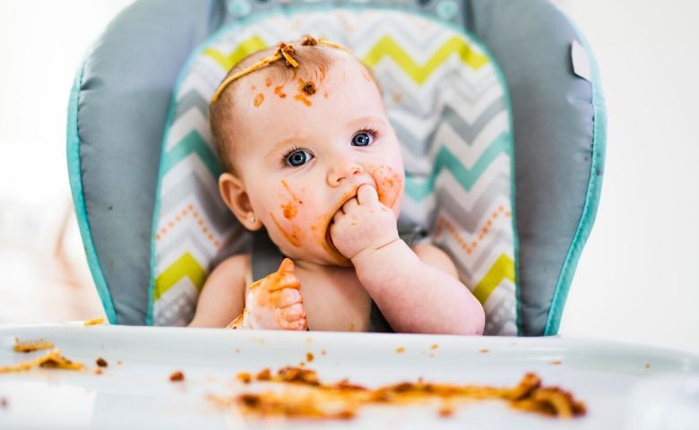 picky toddler eating healthy meal
